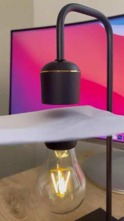 Magnetically suspended and powered lightbulb