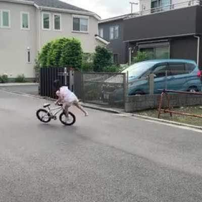 Little kid got some mad skills with her bicycle.