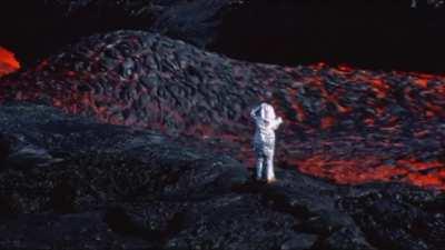 Walking by Lava Rivers And Erupting Volcanos