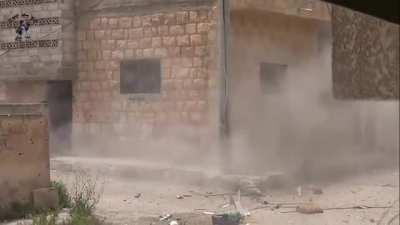 FSA fighter and technical are engaged by return fire while fighting with near disastrous results - Daraa al-Balad - 5/17/2013