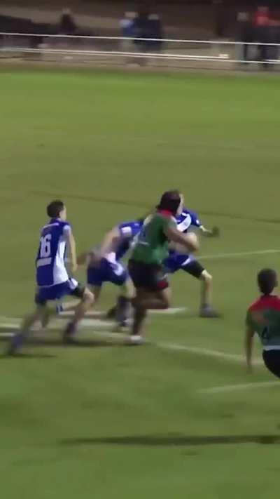 Huge kid playing rugby is unstoppable