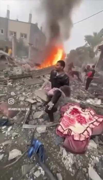 Scenes from the israeli occupation's bombing of a residential building belonging to the Abu Musabah family in Deir al-Balah, in the central Gaza Strip