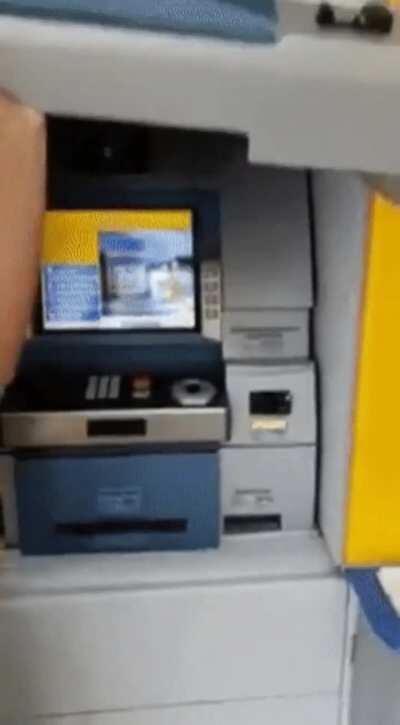 This ridiculously elaborate ATM scam to steal credit card info and pins.