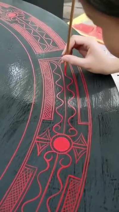 Hand painting a table top