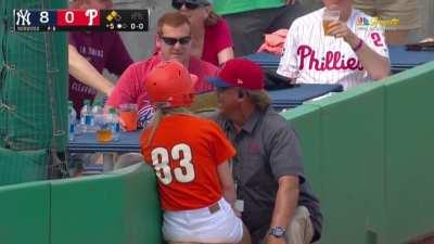 Ball girl accidentally fields a fair ball grounder down the third