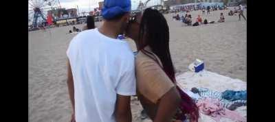 Black guy making out and ass grabbing at the beach