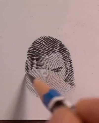 Dude spends hours creating art within his fingerprint 