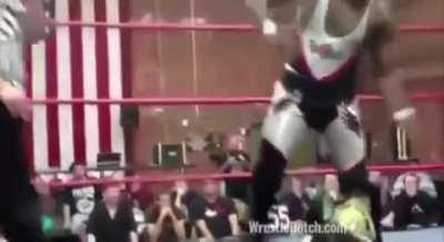 Wrestler headbutts floor