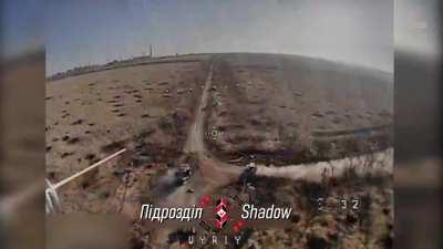 2 Russian soldiers riding the Chinese Desertcross 1000  try to shoot down a Ukrainian FPV drone but it hits them both 