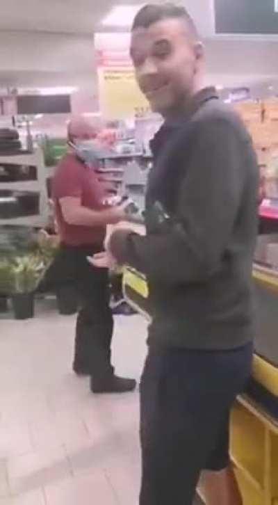 Staff at Lidl in Ireland ejecting a shopper for refusing to wear a mask.