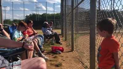 Old man recording his (great?) grandson playing tee ball yesterday on VHS