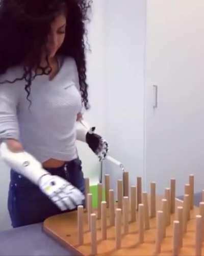 Amputee practicing with her robotic prosthetics 