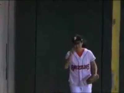 Ball girl climbs wall like spiderman to catch the ball