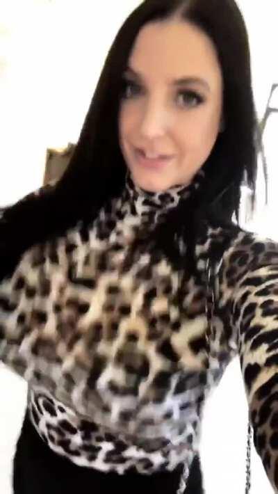 Bouncing breasts in a leopard sweater