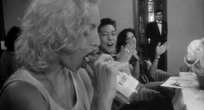 Madonna deep throats a bottle (1991)