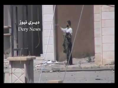 Syrian rebel snipes SAA soldier while he does his laundry. Deir Ezzor, Syria 2013. NSFW