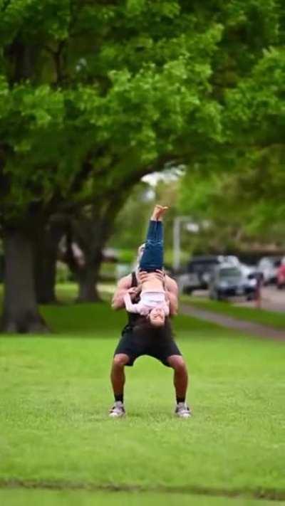 Father is a acrobat. His daughter inherited all his talent genes.