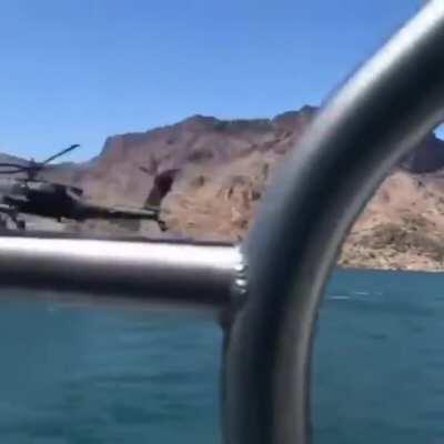 Being overtaken by a helicopter while you're boating is not common..