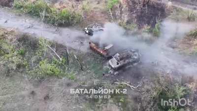 Two Russian soldiers on a bike drive into a Ukrainian ambush, they try to hide themselves in an abandoned MT-LB which is attacked by a drone dropped anti-tank mine (west of Zolotarivka, June 2024)