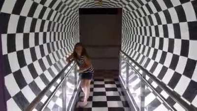 When people walk through the center of a spinning tunnel they can experience vertigo and a loss of equilibrium as their brains receive conflicting signals from their bodies and senses