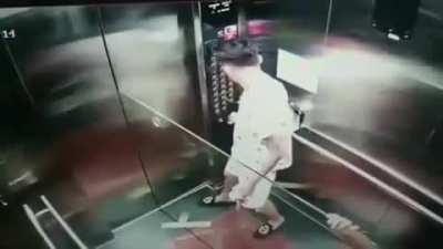 WCGW trying to carry a massive glass pane on an elevator.