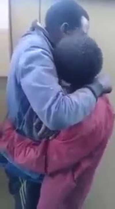 Thieves caught stealing forced to kiss each other