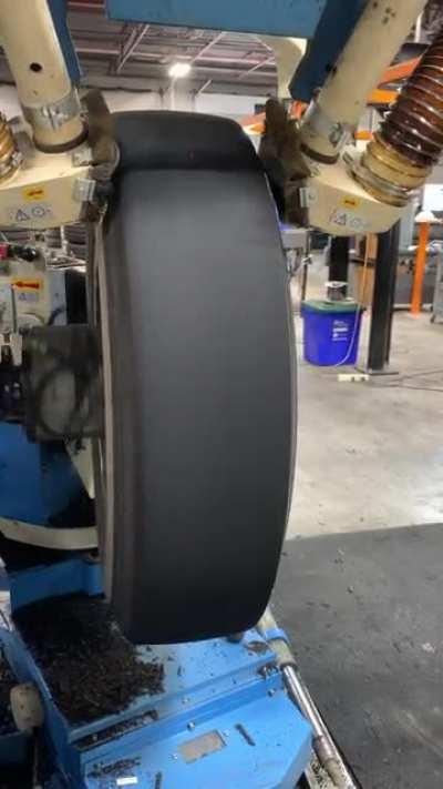 Removing old tread from a tire