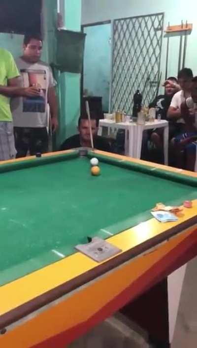 Impressive billiards shot. I miss that pocket most of the time.