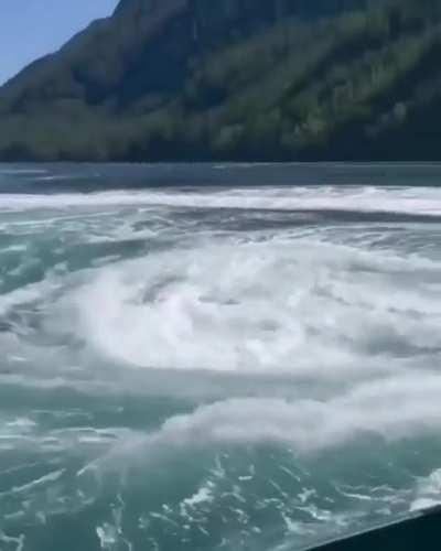 🔥 the edge of a massive whirlpool, at Devils Hole, British Columbia.