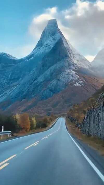 🔥 Stetind is Norway's national mountain, and no wonder. It's a perfect obelisk with sweeping ridges rising straight from the sea