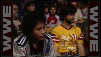 An 11 year old Dwayne &quot;The Rock&quot; Johnson sitting in the crowd watching his father about to wrestle, 1984.