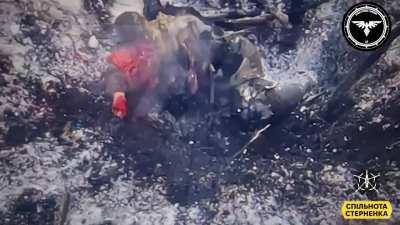 A russian soldier takes a hit from a ukrainian FPV drone near Avdiivka, Febuary 2024.