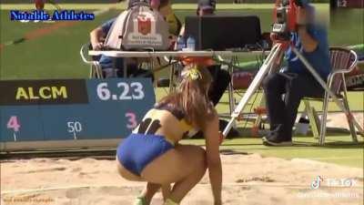 A young girls reaction to beating her long jump record, and her parents are super proud in the crowd!