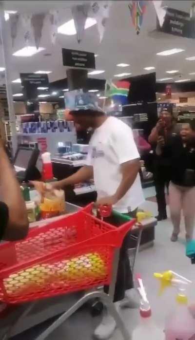 Mapimpi receiving a heroes welcome while grocery shopping