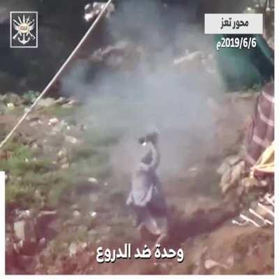 Houthi rebel with an interesting way of firing his RPG. Yemen June 2019