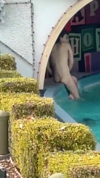 Man skinny dipping at Disneyland