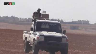 FSA fighters mount an M240 to a Toyota pickup and use it liberally against suspected IS positions outside of Aleppo - November 2016