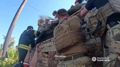 Police paramedics provided first aid to the seriously injured persons after a Russian FAB-250 areal bomb have wounded workers of a local enterprise with shrapnel. Kostyantynivka, Donetsk region.