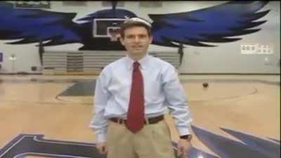 Reporter makes half court shot while reporting a story about high school coach who made a half-court shot.