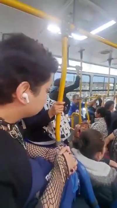 Christian woman harasses a man for wearing a skirt and makeup while riding a bus in Bogotá, Colombia 