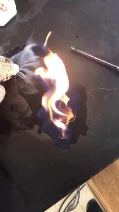 Carbon dioxide gas from solid CO2 (aka dry ice) suffocating a fire