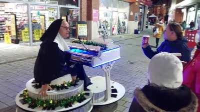 If Vic Reeves and Ade Edmondson had a love child who was also a male nun. (Please excuse my laugh in the background)