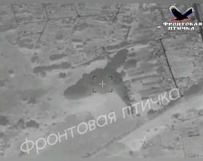 Iskander-M strikes a MLRS (claimed RM-70) northeast of Kharkiv city, viewed from a thermal drone