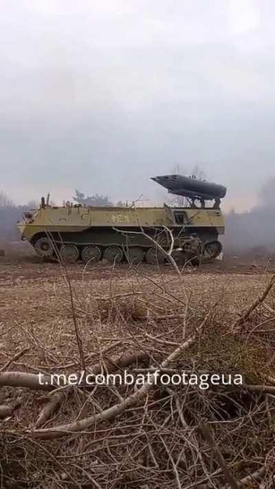 Ukrainian soldiers are firing at Russian positions from a makeshift MLRS based on MT-LB.