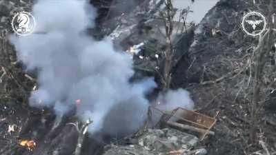 Ukrainian FPV drone hits and destroys a Russian armored vehicle with the corpses of Russian infantry ontop north of Avdiivka. December 2023