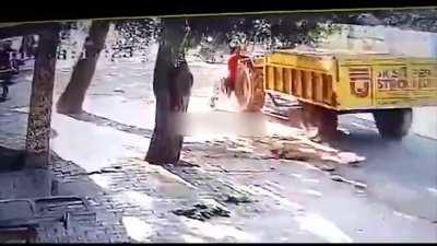 Guy Tries To Get On Moving Tractor, Gets Run Over