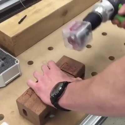 Turning screws inside a piece of wood using a magnetic drill