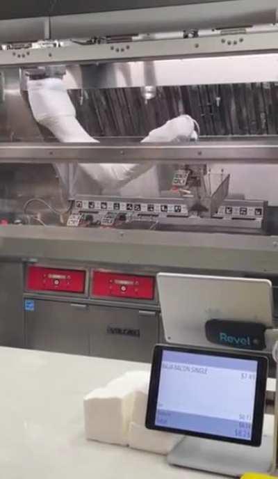 Automated machine making fries at McDonalds