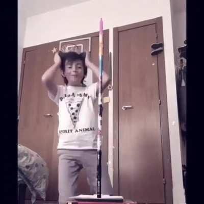 This kid stacked 8 markers together, flipped it, landed upright