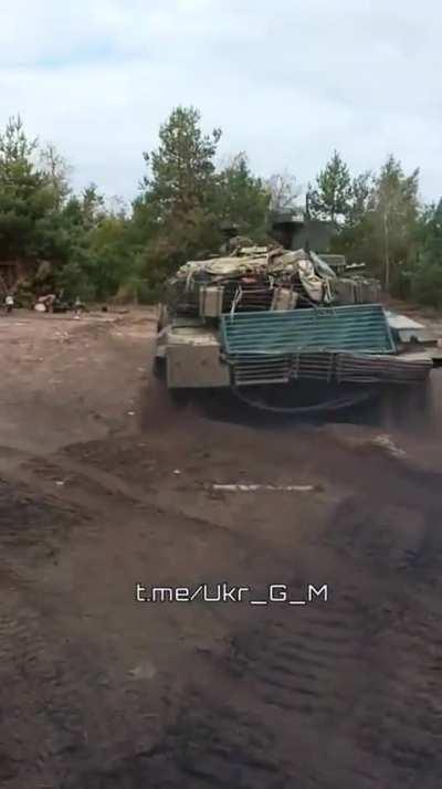 Russian tank operator bouncing his T-90 like hydrolics on lowrider and then doing donuts